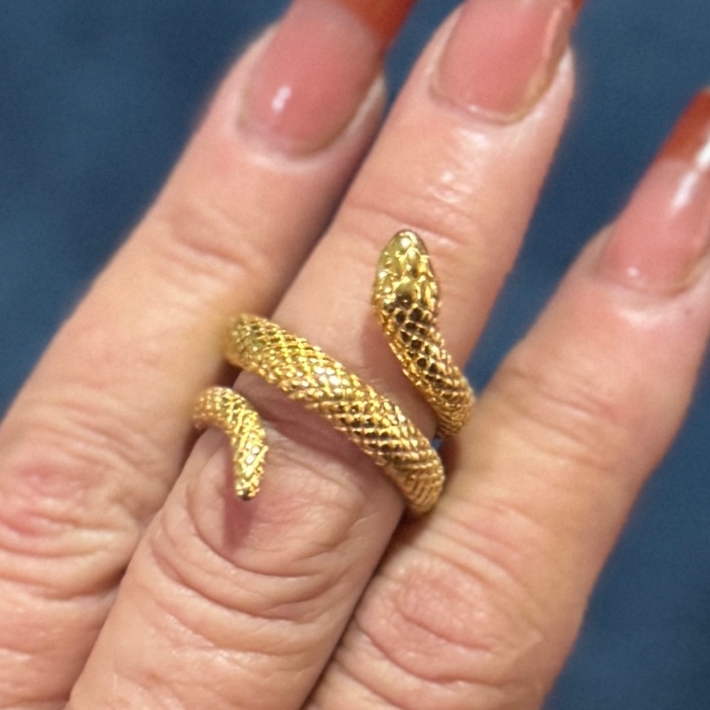 Elegant gold snake wrap ring.